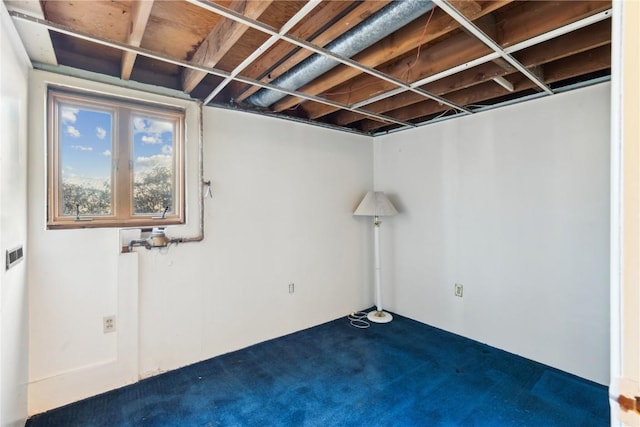 basement featuring carpet flooring