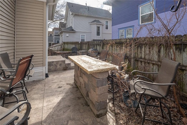 view of patio / terrace with exterior bar