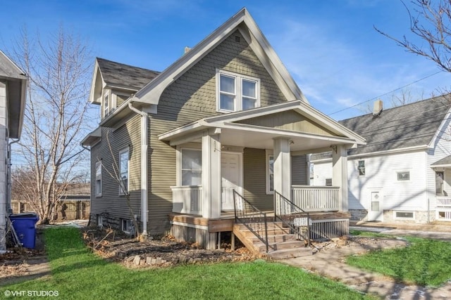 view of front of property featuring covered porch