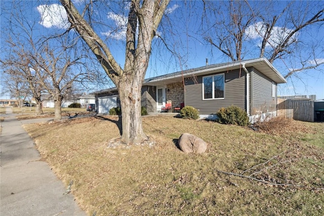 single story home featuring a garage