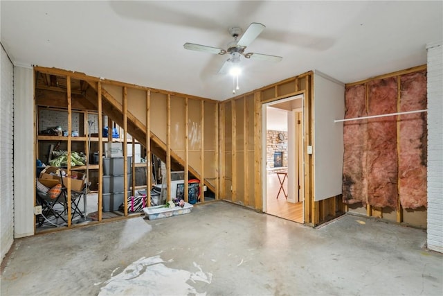 interior space featuring ceiling fan