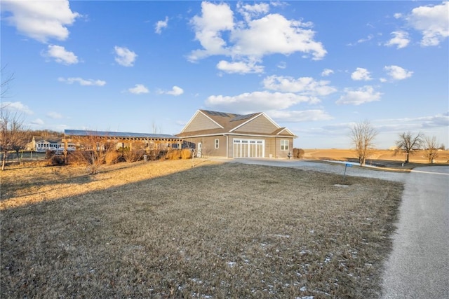 ranch-style home with a garage