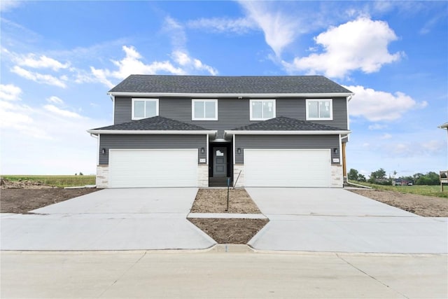 view of property featuring a garage