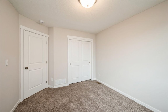 6188 Cope Dr, Marion, IA 52302 - unfurnished bedroom featuring carpet flooring, baseboards, and a closet