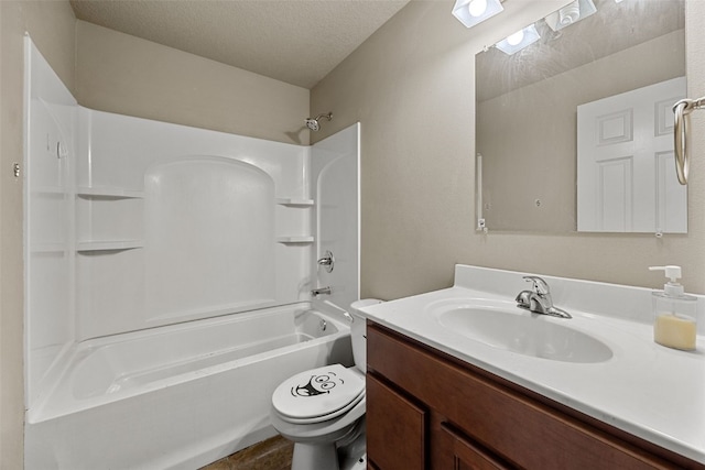 full bathroom featuring shower / bath combination, vanity, a textured ceiling, and toilet