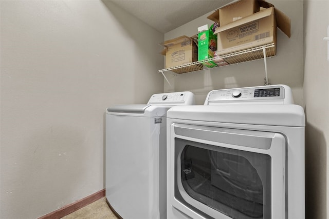 laundry room with separate washer and dryer