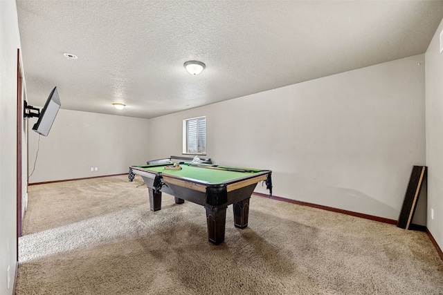 game room featuring billiards, carpet flooring, and a textured ceiling