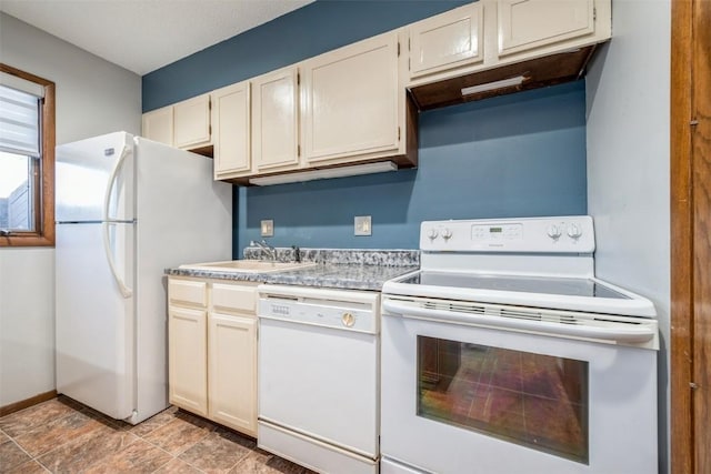 kitchen with sink and white appliances