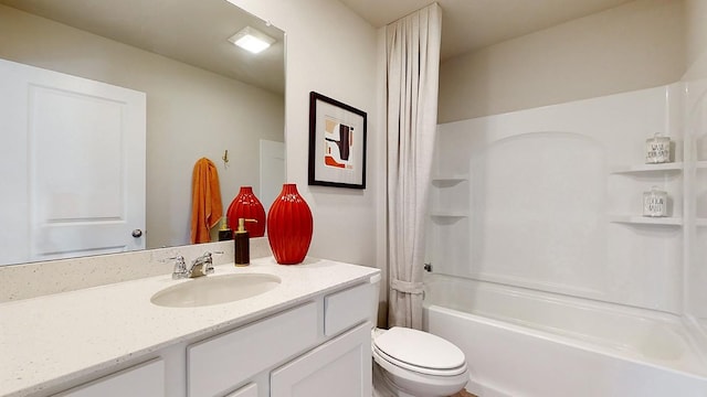 full bathroom with toilet, vanity, and shower / tub combo with curtain