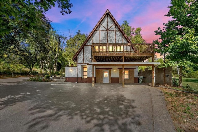 tudor house featuring a deck