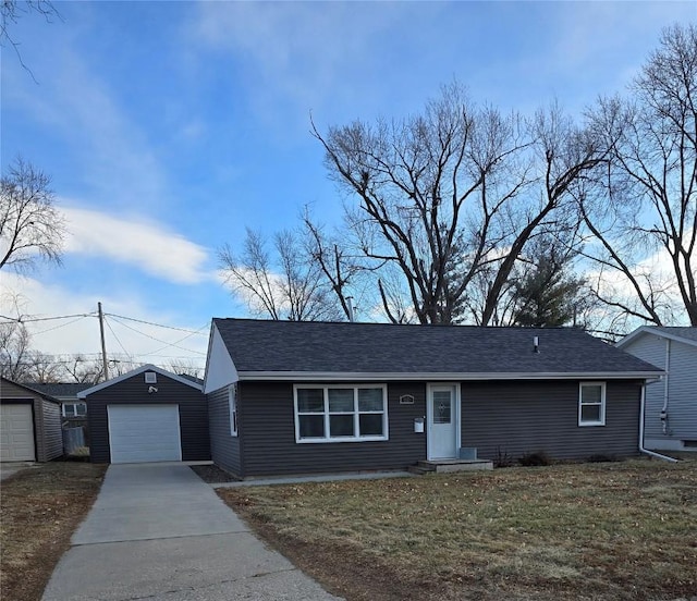 view of front of house featuring an outbuilding and a garage