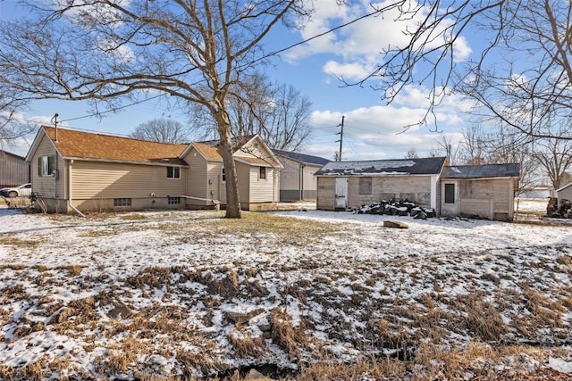 view of snow covered property