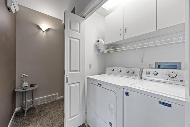 laundry room featuring dark colored carpet and washing machine and clothes dryer