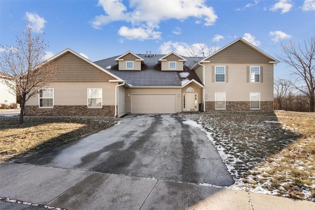 front of property with a garage