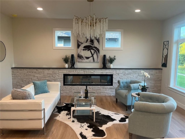 sitting room featuring light hardwood / wood-style floors and a fireplace