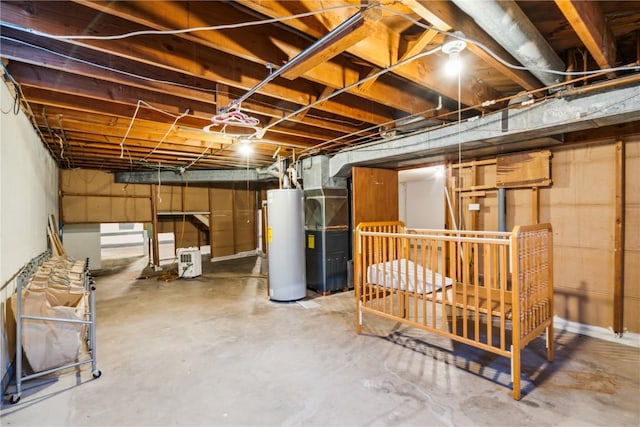 basement with water heater and heating unit