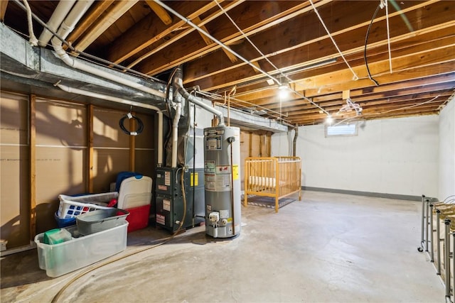 basement featuring heating unit and water heater