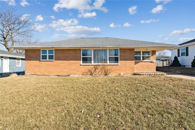 single story home featuring a front yard