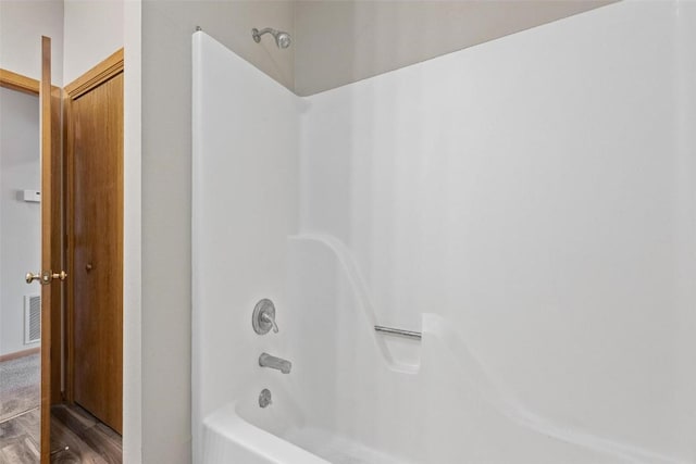 bathroom with shower / bath combination