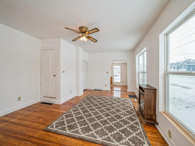 interior space featuring ceiling fan and wood-type flooring