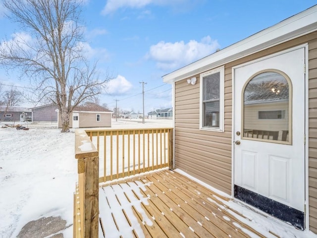 view of snow covered deck