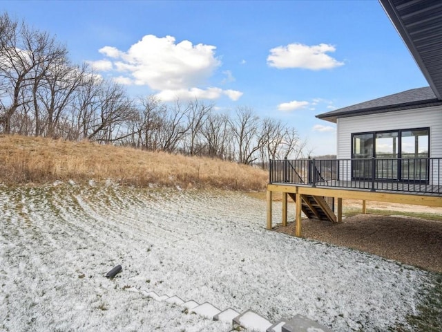 view of yard featuring a wooden deck