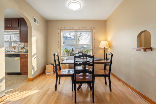 dining room featuring light hardwood / wood-style floors