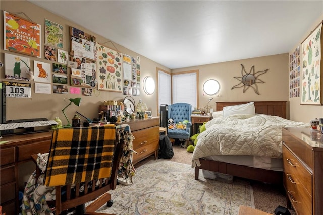 bedroom with light colored carpet