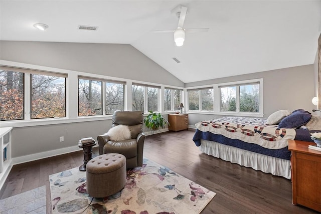 bedroom with vaulted ceiling, dark hardwood / wood-style floors, and ceiling fan