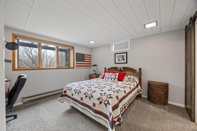 bedroom with a baseboard radiator, a barn door, carpet flooring, and wood ceiling