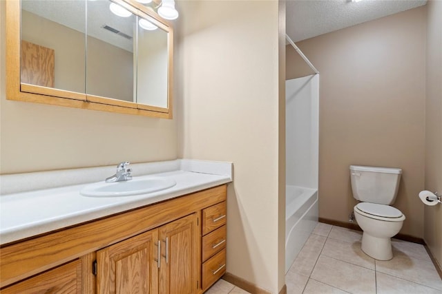 full bathroom with tile patterned floors, toilet, bathing tub / shower combination, a textured ceiling, and vanity