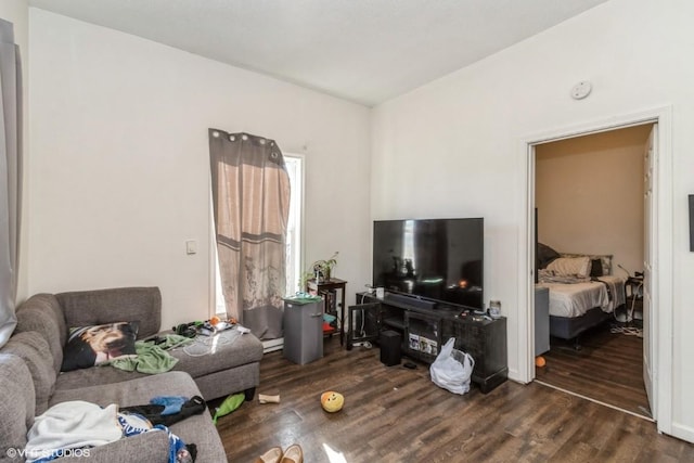 living room featuring dark hardwood / wood-style floors