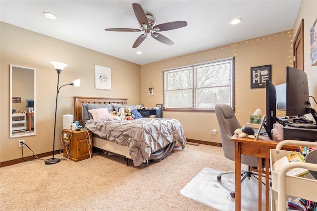 carpeted bedroom featuring ceiling fan