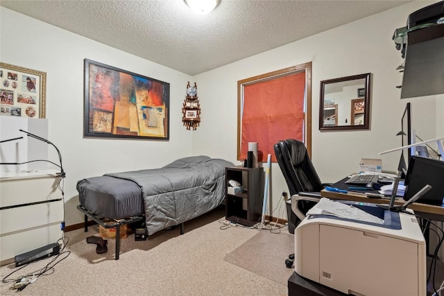 carpeted bedroom with a textured ceiling