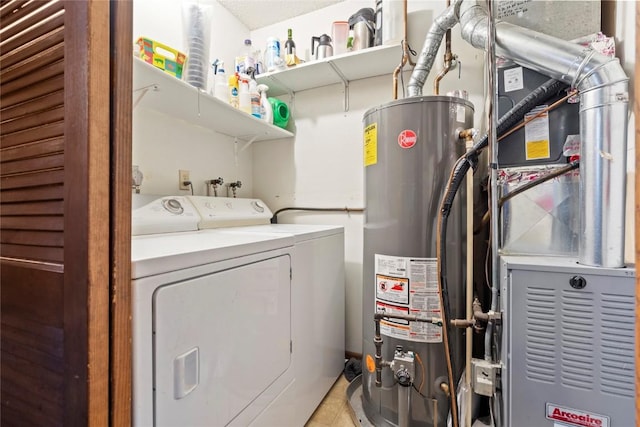 washroom with heating unit, washing machine and dryer, water heater, and light tile patterned floors