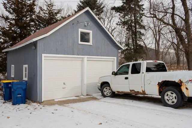 view of snow covered garage