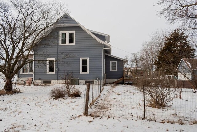 view of snow covered house