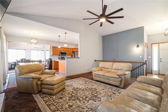 living room featuring vaulted ceiling