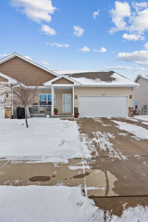 ranch-style home with a garage