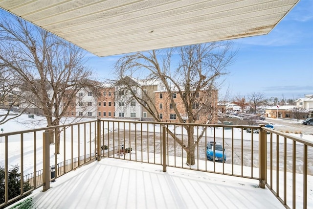 view of snow covered deck