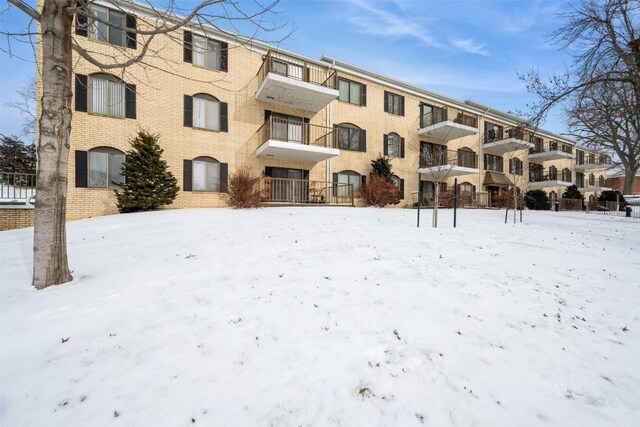 view of snow covered property