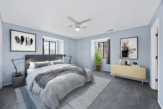 carpeted bedroom with ceiling fan