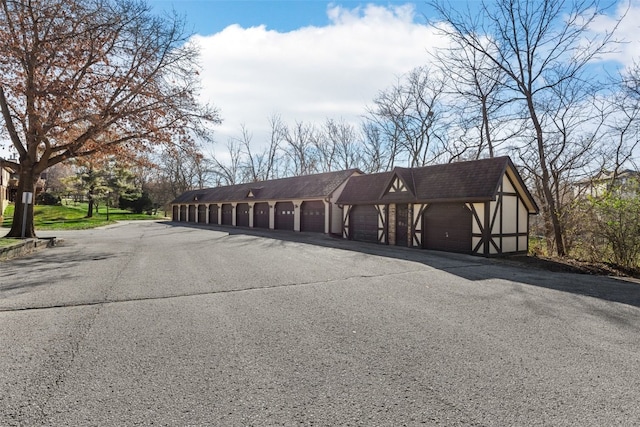 exterior space with a garage