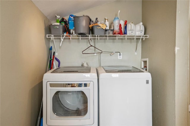 laundry area with separate washer and dryer