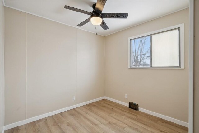 unfurnished room featuring ceiling fan and light hardwood / wood-style floors