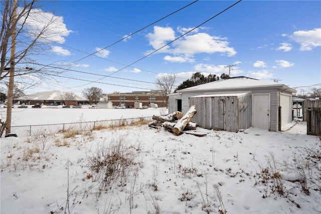 view of yard layered in snow