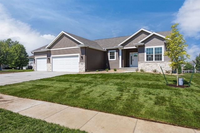 750 Hampshire Dr, Marion, IA 52302 - view of front facade with stone siding, an attached garage, and a front yard