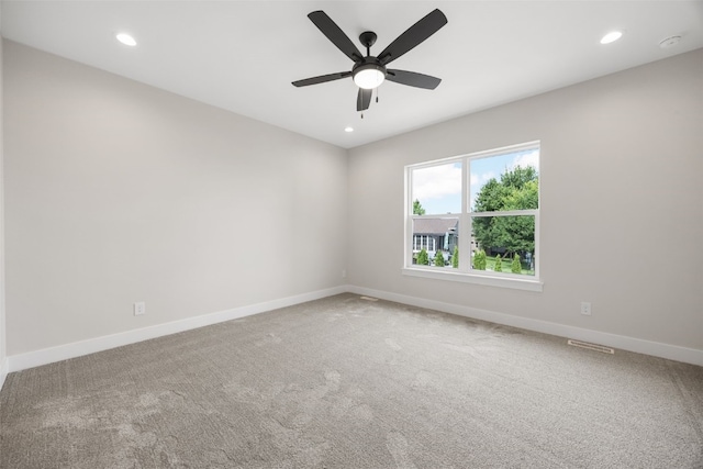 750 Hampshire Dr, Marion, IA 52302 - unfurnished room featuring a smoke detector, recessed lighting, a ceiling fan, and carpet floors