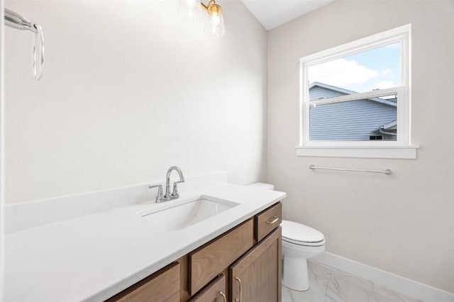 750 Hampshire Dr, Marion, IA 52302 - bathroom featuring vanity and marble finish floors