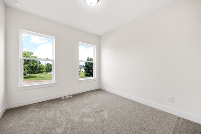 750 Hampshire Dr, Marion, IA 52302 - spare room with carpet flooring and a smoke detector